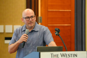 Bastian Bentlage, associate professor of Bioinformatics at the UOG Marine Lab and one of the leads from UOG, speaks at the November town hall meeting, 'Ocean Energy Systems to Power Guam Aquaculture.' Bentlage states that UOG'd primary role in the project is to provide insights into site-specific considerations for evaluating the feasibility of deploying ocean energy systems.