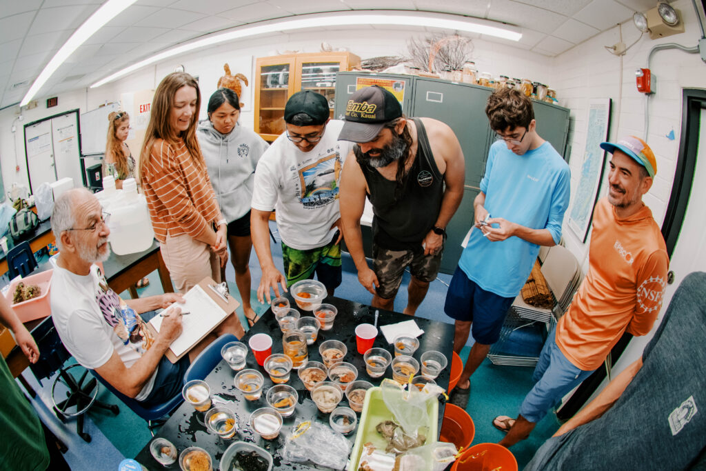 Participants of the UOG Marine Lab & NAVFAC Porifera workshop gather after a sea sponge specimen collecting session.