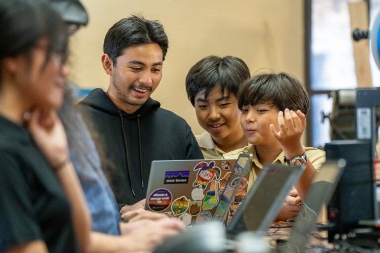 UOG Center for Island Sustainability and Sea Grant Research Education and Extension Fellow Napu Blas assists during the workshop at the G3 Makerspace. The 3D printing workshop welcomed participants from many age groups including students and local makers.