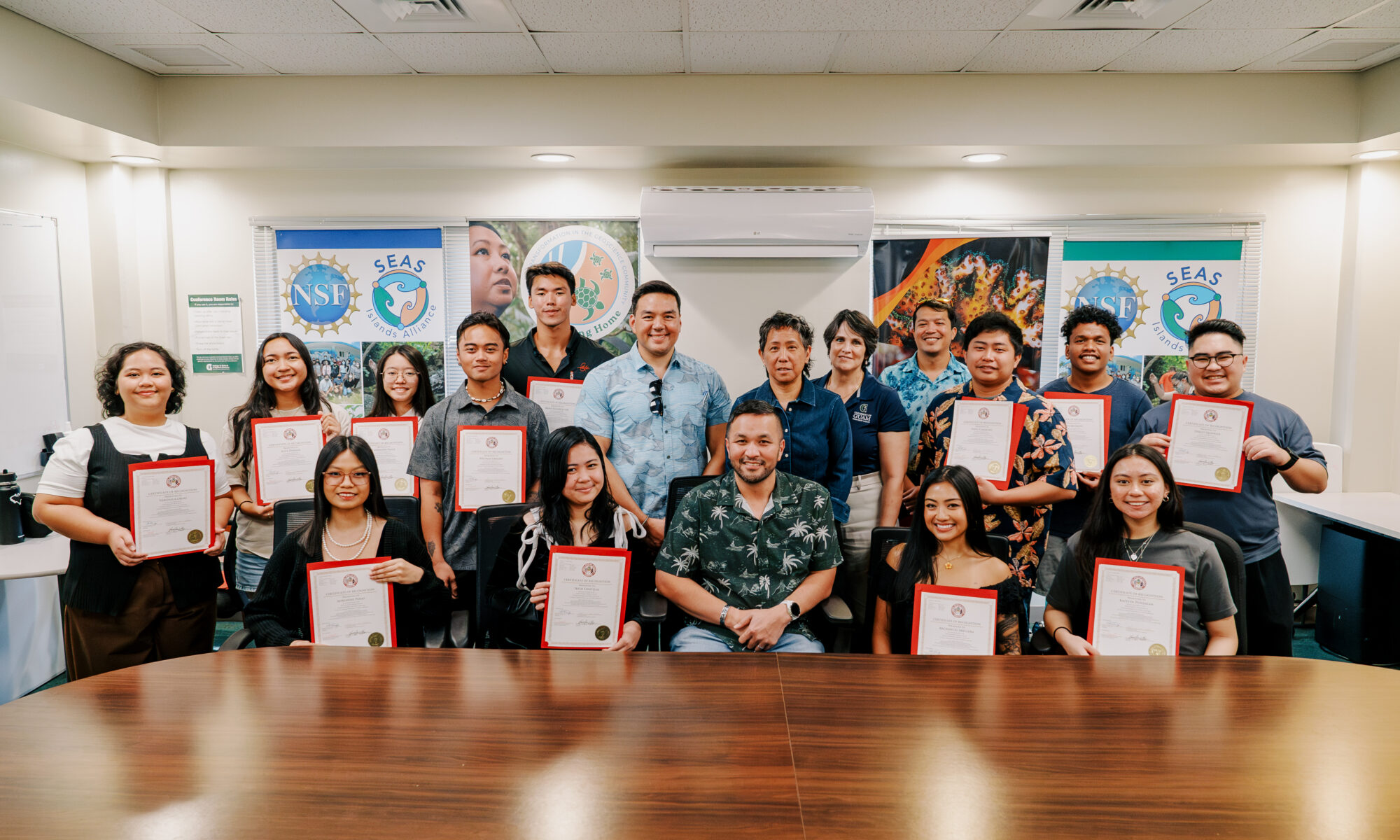 University of Guam students who attended the 2025 Society for the Advancement of Chicanos/Hispanics and Native Americans in Science National Diversity in STEM Conference are recognized during a certificate presentation in January at the UOG College of Natural and Applied Sciences conference room. Pictured with the students are UOG Center for Island Sustainability and Sea Grant Director Austin Shelton, Ph.D.; College of Natural and Applied Sciences Dean and Director Rachael Leon Guerrero, Ph.D.; and Cheryl Sangueza, Ph.D., co-principal investigator of the NSF INCLUDES SEAS and NSF Navigating Home grants and head of student experience for Guam NSF EPSCoR. Sen. Vincent A.V. Borja, chair of the Legislature’s Committee on Education, presented the certificates.