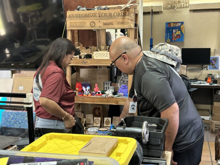 Guam Department of Education (GDOE) librarians examine products created using the various tools available in the G3 Makerspace studio. The group toured the facility at CHamoru Village in February as part of the 2026 GDOE Annual Library Conference.