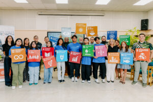 Guam Green Growth (G3) Youth Conservation Corps pose for a group photo with leadership from the University of Guam Center for Island Sustainability and Sea Grant