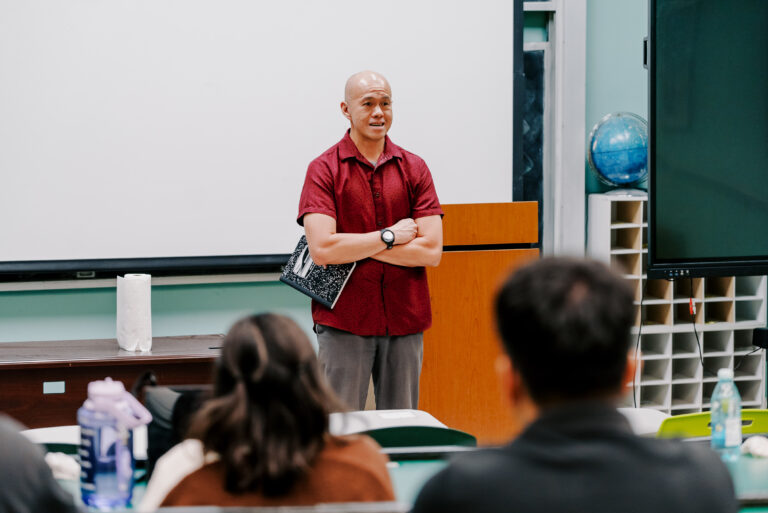 Michael L. Chan, Ed.D., Dean of the School of Technology & Student Services at Guam Community College and Co-Principal Investigator for Guam NSF EPSCoR E-RISE, speaks at the orientation for the 2026 Summer Math Research Experience (SMRE) program.
