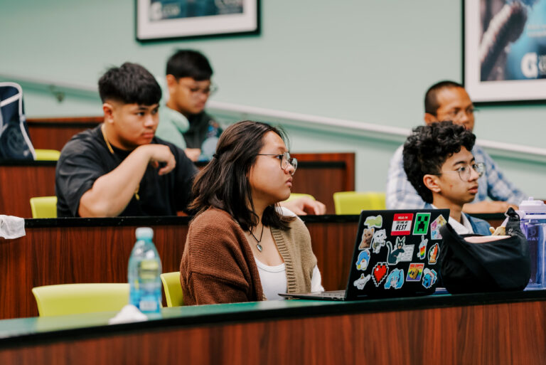 Participants of the 2026 Guam NSF EPSCoR Summer Math Research Experience (SMRE) listen during the program orientation.