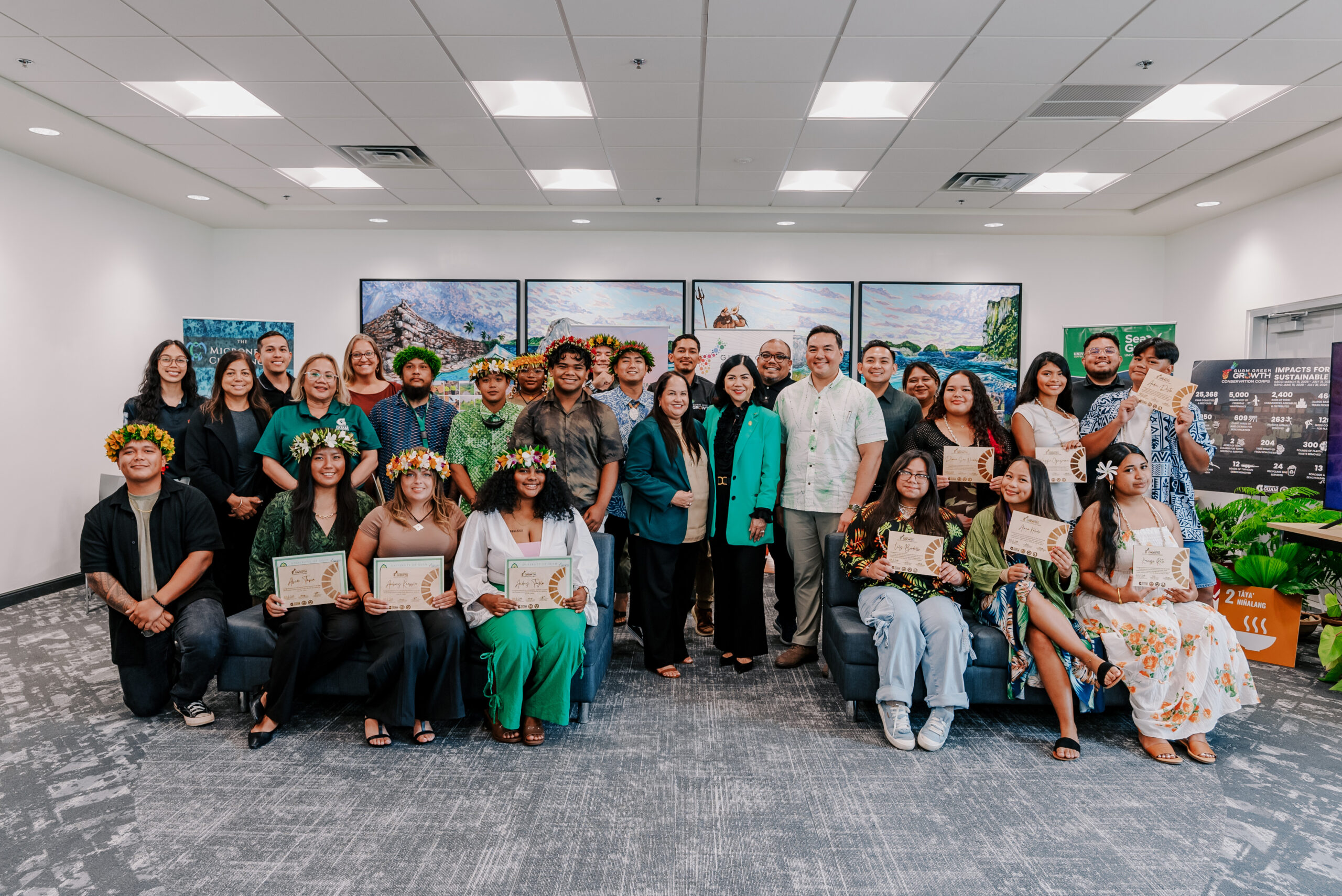 University of Guam President Anita Borja Enriquez, DBA, UOG Center for Island Sustainability and Sea Grant Director Austin Shelton, Ph.D., and program leaders join graduates of the sixth Guam Green Growth (G3) Conservation Corps cohort and G3 Youth Conservation Corps in group photo